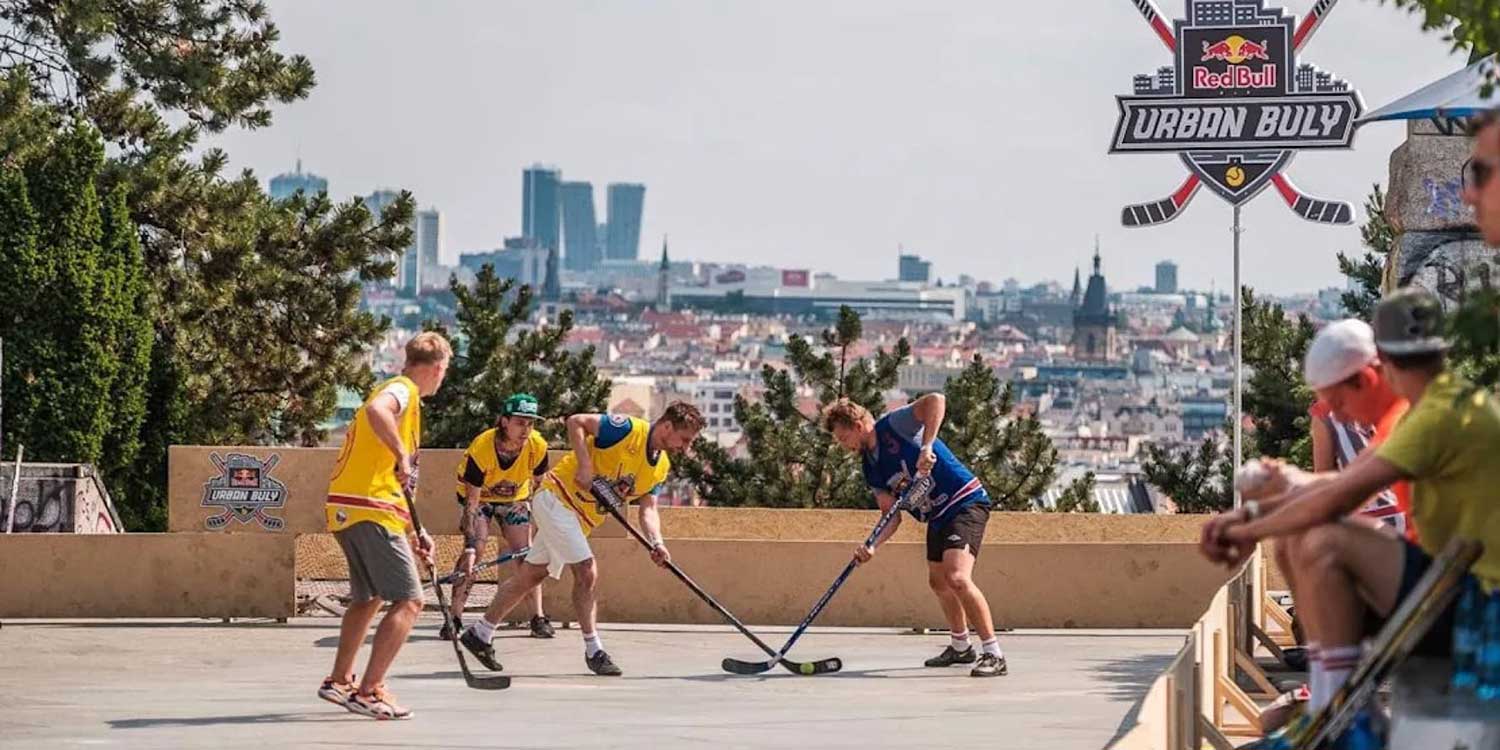 Guys playing florbal in Prague.
